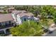 Aerial view of a two-story home featuring lush landscaping, a well manicured lawn and a beautiful exterior at 20437 W White Rock Rd, Buckeye, AZ 85396