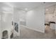 Upstairs hallway with carpet floors and decorative railing at 20437 W White Rock Rd, Buckeye, AZ 85396