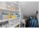 The pantry provides extra storage with a variety of shelving for storing supplies at 20437 W White Rock Rd, Buckeye, AZ 85396