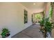 View of an arched patio with view of greenery and seating at 20437 W White Rock Rd, Buckeye, AZ 85396