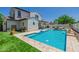 Refreshing pool in backyard with inviting lounge areas, offering a perfect setting for relaxation and recreation at 20437 W White Rock Rd, Buckeye, AZ 85396