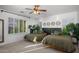 Inviting bedroom with twin beds, stylish decor, and lots of natural light at 2056 E Carob Dr, Chandler, AZ 85286