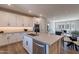 Contemporary kitchen with white cabinets, stainless steel appliances, and an open layout to the living area at 2121 W Sonoran Desert Dr # 45, Phoenix, AZ 85085