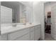 Bright bathroom with double sink vanity, modern fixtures, and a walk-in shower at 23112 E Twilight Dr, Queen Creek, AZ 85142