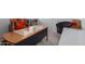 Functional home office space with desk and chair, ideal for work or study, plus a comfortable seat at 23112 E Twilight Dr, Queen Creek, AZ 85142