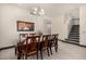 Elegant dining room with classic furniture and hardwood flooring at 2461 E Stephens Pl, Chandler, AZ 85225