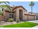 Charming home with a well-manicured lawn and a welcoming entrance at 2461 E Stephens Pl, Chandler, AZ 85225