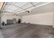 Spacious garage with high ceilings, lighting, and storage at 2461 E Stephens Pl, Chandler, AZ 85225