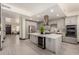 Modern kitchen featuring an island, stainless steel appliances, and sleek cabinetry at 2461 E Stephens Pl, Chandler, AZ 85225
