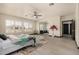 The main bedroom has a seating area, large windows, and plenty of space for relaxation at 2461 E Stephens Pl, Chandler, AZ 85225