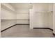 Spacious walk-in closet with ample shelving and wood-style flooring, providing plenty of storage at 2461 E Stephens Pl, Chandler, AZ 85225