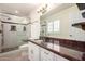 Bathroom features granite countertops, walk-in shower with glass door, and tile floors at 2547 W Naranja Ave, Mesa, AZ 85202