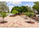 Lakeside park scenery with trees, open space, picnic and seating area, offering tranquility and community enjoyment at 2547 W Naranja Ave, Mesa, AZ 85202