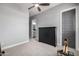 Bedroom with an exercise machine, and a spacious closet at 26314 N 103Rd Dr, Peoria, AZ 85383