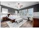 A bedroom with an abundance of natural light, hard wood flooring, and ample closet space at 26314 N 103Rd Dr, Peoria, AZ 85383