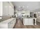 Gourmet kitchen featuring modern appliances, ample counter space, and custom cabinetry at 26314 N 103Rd Dr, Peoria, AZ 85383