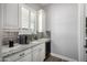 Kitchenette with stainless steel appliances, granite countertops, subway tile backsplash and white cabinets at 26314 N 103Rd Dr, Peoria, AZ 85383
