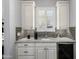 Kitchenette with stainless steel appliances, granite countertops, subway tile backsplash and white cabinets at 26314 N 103Rd Dr, Peoria, AZ 85383