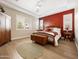 Bedroom with neutral tones, hardwood floors, fan, and natural light at 30287 N 115Th Dr, Peoria, AZ 85383