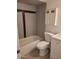 Traditional bathroom with tiled shower and white vanity at 3119 W Cochise Dr # 148, Phoenix, AZ 85051