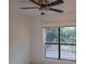 The bedroom has a ceiling fan, a window with blinds and a security screen at 3119 W Cochise Dr # 148, Phoenix, AZ 85051