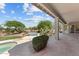 Covered patio with desert landscaping and a large pool, providing a luxurious outdoor experience at 31234 N 47Th Pl, Cave Creek, AZ 85331