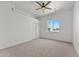 The bedroom features a ceiling fan and a view of the exterior trees at 31234 N 47Th Pl, Cave Creek, AZ 85331