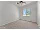 Neutral bedroom with a view of exterior trees via single window at 31234 N 47Th Pl, Cave Creek, AZ 85331