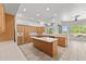Bright kitchen featuring a large island, plenty of cabinet space and outdoor views at 31234 N 47Th Pl, Cave Creek, AZ 85331