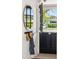 Stylish entryway with a round mirror, coat hooks, and a view of the outdoors at 3201 E Colter St, Phoenix, AZ 85018