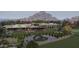 Expansive clubhouse with outdoor dining, lush landscaping, and mountain views at 3201 E Colter St, Phoenix, AZ 85018