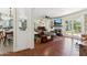 Open-concept living room with a fireplace, comfortable seating, and seamless flow to the kitchen at 3201 E Colter St, Phoenix, AZ 85018