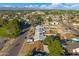 View of the neighborhood featuring tree-lined streets, well-maintained homes, and stunning mountain views in the distance at 3649 E Delcoa Dr, Phoenix, AZ 85032
