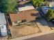 Home exterior with neutral paint, well-kept landscaping, and a covered carport for convenient parking at 3649 E Delcoa Dr, Phoenix, AZ 85032