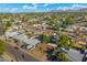 Residential neighborhood featuring cozy single-Gathering homes, mature landscaping, and views of a beautiful mountain range at 3649 E Delcoa Dr, Phoenix, AZ 85032