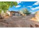 View of the backyard with a covered patio and a shed at 3649 E Delcoa Dr, Phoenix, AZ 85032
