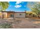Backyard featuring a shed and a covered patio at 3649 E Delcoa Dr, Phoenix, AZ 85032