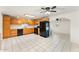 Bright, spacious kitchen featuring tile flooring, black appliances, ample cabinetry, and great natural light at 3649 E Delcoa Dr, Phoenix, AZ 85032