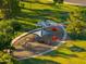 Aerial view of a park playground featuring covered play structures and mature landscaping at 3649 E Delcoa Dr, Phoenix, AZ 85032
