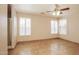 Bedroom featuring tile flooring, neutral walls, and bay window with blinds at 3750 S Conestoga Rd, Apache Junction, AZ 85119