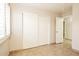 Bedroom with tile floors, sliding door closet, and natural light from the window at 3750 S Conestoga Rd, Apache Junction, AZ 85119