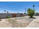Spacious backyard featuring privacy fence, a brick BBQ and shade trees at 3807 N 56Th Dr, Phoenix, AZ 85031