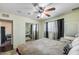 Spacious bedroom with mirrored closet doors and neutral decor at 3807 N 56Th Dr, Phoenix, AZ 85031
