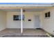 Inviting front porch with a cozy seating area, perfect for enjoying warm evenings at 3807 N 56Th Dr, Phoenix, AZ 85031