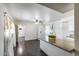 Kitchen boasts a center island with granite countertops and a ceiling fan at 3807 N 56Th Dr, Phoenix, AZ 85031