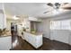 Spacious kitchen with granite counters, ceiling fan, and access to modern appliances, perfect for any cook at 3807 N 56Th Dr, Phoenix, AZ 85031