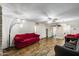 The living room features hardwood floors and a modern light fixture at 3807 N 56Th Dr, Phoenix, AZ 85031
