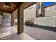 Covered back patio with brick pavers provides shade and outdoor living space at 3850 E Geronimo St, Gilbert, AZ 85295