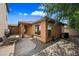 Charming backyard showcasing a covered patio and landscaping; perfect for relaxation and outdoor enjoyment at 3850 E Geronimo St, Gilbert, AZ 85295