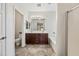 Bright bathroom features double sinks, a large mirror, and a separate tub and toilet area at 3850 E Geronimo St, Gilbert, AZ 85295